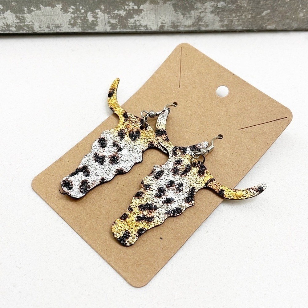 Animal print ox head hand made earrings